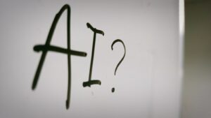 a sign with a question mark and a question mark drawn on it